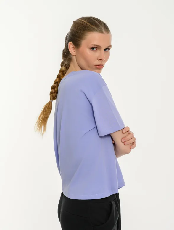 Γυναικείο κοντομάνικο crop top με τύπωμα manifest-mainImage-4