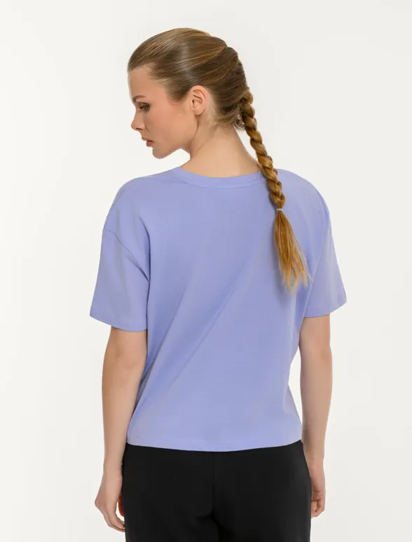 Γυναικείο κοντομάνικο crop top με τύπωμα manifest-mainImage-5